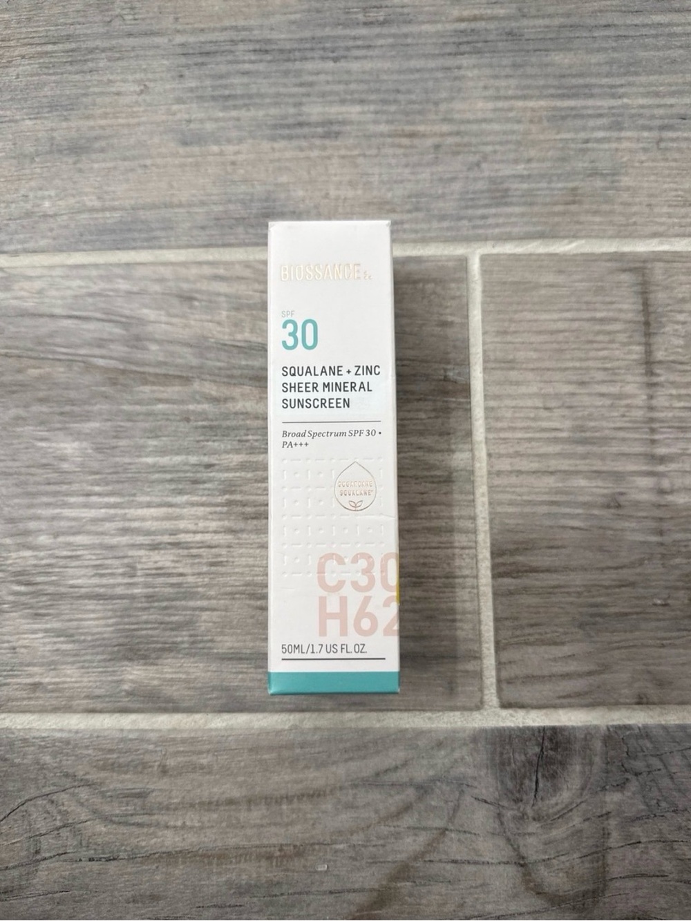 Biossance Sheer Mineral Sunscreen SPF 30 - White with Teal Accent